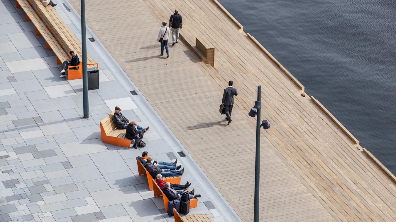 Harbor promenade with benches. Photo